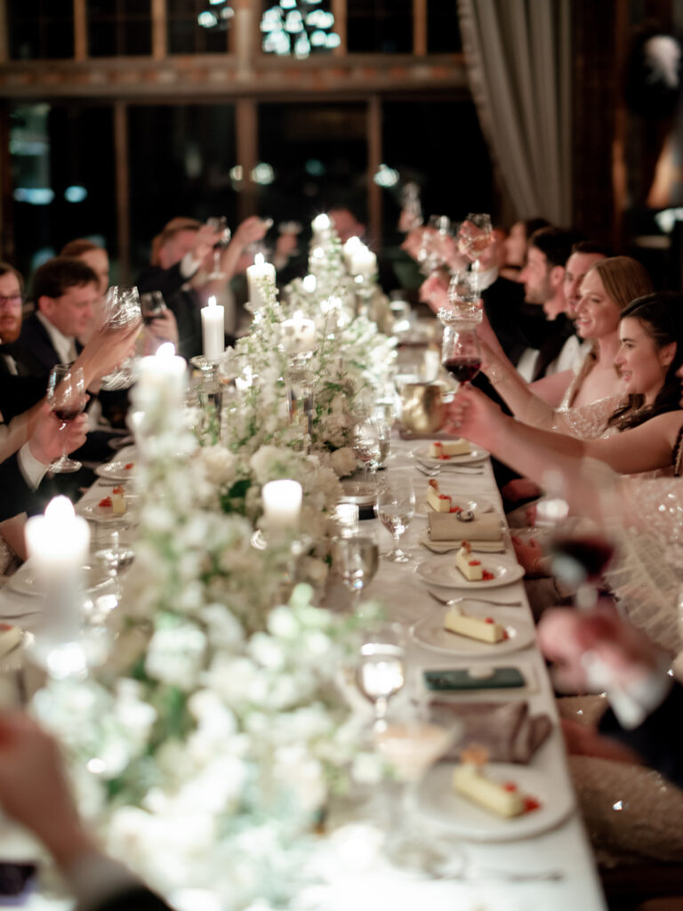 guests toasting at wedding reception at brush creek ranch